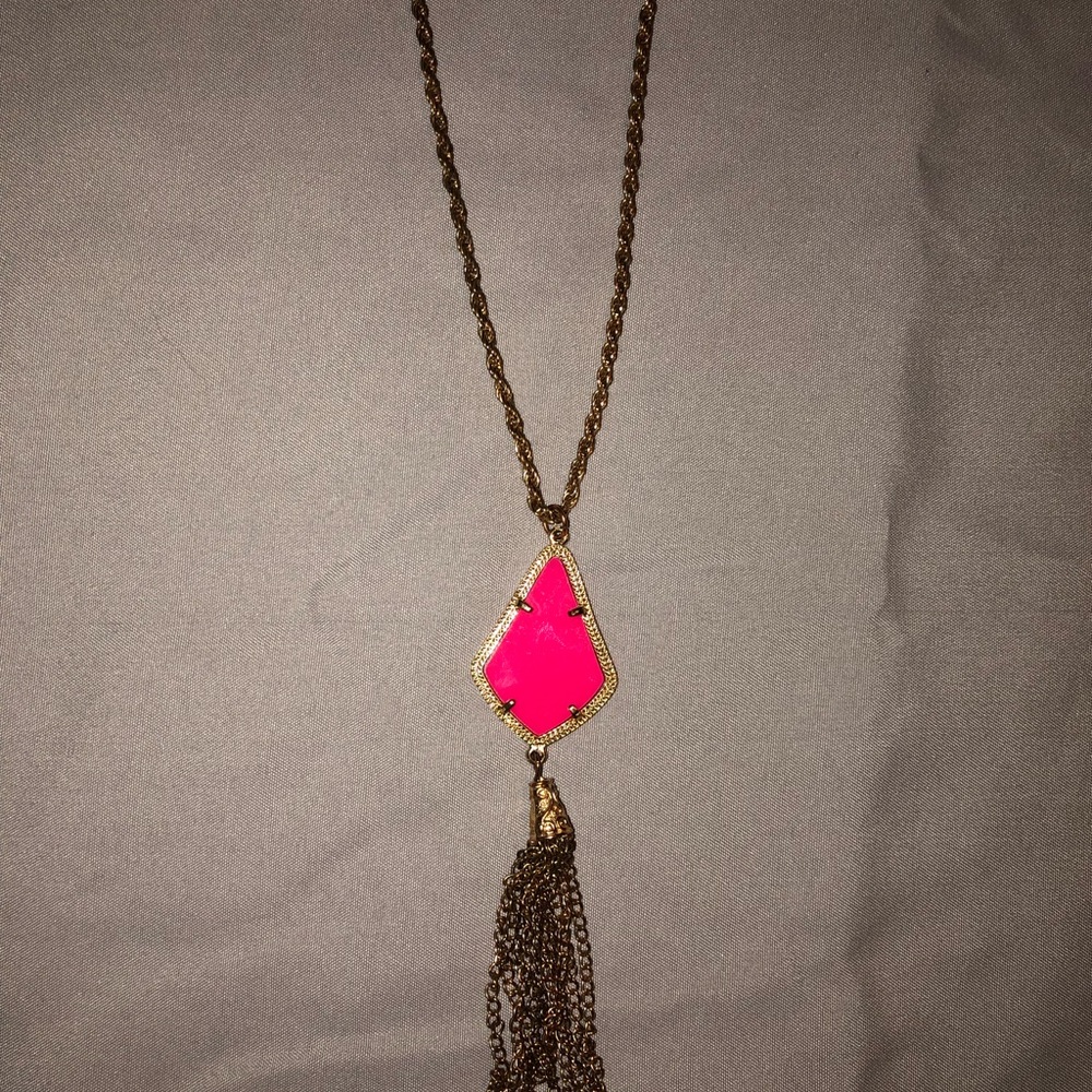 Francesca’s pink and gold tassel necklace